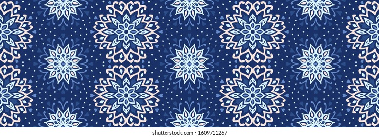 Seamless floral pattern. Stylized doodle flowers. Spanish ethnic embroidery. Folk ornament. Solar sign. Mediterranean print. Indian Oriental or Turkish textiles. Boho wallpaper. Hipster art.