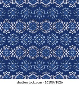 Seamless floral pattern. Stylized doodle flowers. Spanish ethnic embroidery. Folk ornament. Solar sign. Mediterranean print. Indian Oriental or Turkish textiles. Boho wallpaper. Hipster art.