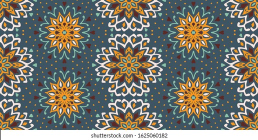 Seamless floral pattern. Stylized doodle flowers. Spanish ethnic embroidery. Folk ornament. Solar sign. Mediterranean print. Indian Oriental or Turkish textiles. Boho wallpaper. Hipster art.