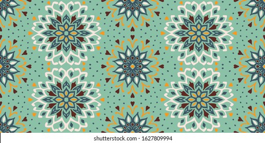 Seamless floral pattern. Stylized doodle flowers. Spanish ethnic embroidery. Folk ornament. Solar sign. Mediterranean print. Indian Oriental or Turkish textiles. Boho wallpaper. Hipster art.