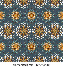 Seamless floral pattern. Stylized doodle flowers. Spanish ethnic embroidery. Folk ornament. Solar sign. Mediterranean print. Indian Oriental or Turkish textiles. Boho wallpaper. Hipster art.