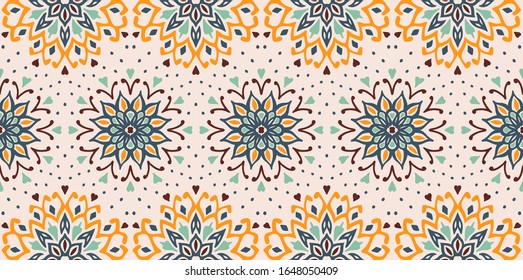 Seamless floral pattern. Stylized doodle flowers. Spanish ethnic embroidery. Folk ornament. Solar sign. Mediterranean print. Indian Oriental or Turkish textiles. Boho wallpaper. Hipster art.