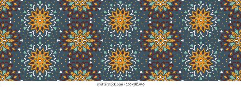 Seamless floral pattern. Stylized doodle flowers. Spanish ethnic embroidery. Folk ornament. Solar sign. Mediterranean print. Indian Oriental or Turkish textiles. Boho wallpaper. Hipster art.