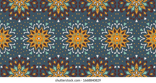 Seamless floral pattern. Stylized doodle flowers. Spanish ethnic embroidery. Folk ornament. Solar sign. Mediterranean print. Indian Oriental or Turkish textiles. Boho wallpaper. Hipster art.