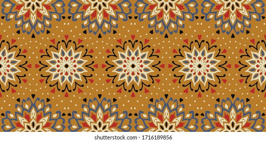 Seamless floral pattern. Stylized doodle flowers. Spanish ethnic embroidery. Folk ornament. Solar sign. Mediterranean print. Indian Oriental or Turkish textiles. Boho wallpaper. Hipster art.