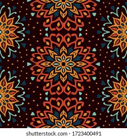 Seamless floral pattern. Stylized doodle flowers. Spanish ethnic embroidery. Folk ornament. Solar sign. Mediterranean print. Indian Oriental or Turkish textiles. Boho wallpaper. Hipster art.