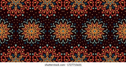 Seamless floral pattern. Stylized doodle flowers. Spanish ethnic embroidery. Folk ornament. Solar sign. Mediterranean print. Indian Oriental or Turkish textiles. Boho wallpaper. Hipster art.
