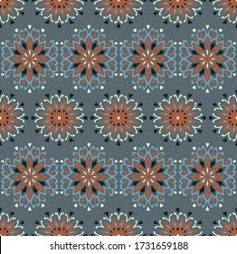 Seamless floral pattern. Stylized doodle flowers. Spanish ethnic embroidery. Folk ornament. Solar sign. Mediterranean print. Indian Oriental or Turkish textiles. Boho wallpaper. Hipster art.