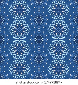 Seamless floral pattern. Stylized doodle flowers. Spanish ethnic embroidery. Folk ornament. Solar sign. Mediterranean print. Indian Oriental or Turkish textiles. Boho wallpaper. Hipster art.