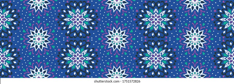 Seamless floral pattern. Stylized doodle flowers. Spanish ethnic embroidery. Folk ornament. Solar sign. Mediterranean print. Indian Oriental or Turkish textiles. Boho wallpaper. Hipster art.