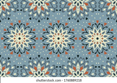 Seamless floral pattern. Stylized doodle flowers. Spanish ethnic embroidery. Folk ornament. Solar sign. Mediterranean print. Indian Oriental or Turkish textiles. Boho wallpaper. Hipster art.