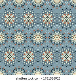 Seamless floral pattern. Stylized doodle flowers. Spanish ethnic embroidery. Folk ornament. Solar sign. Mediterranean print. Indian Oriental or Turkish textiles. Boho wallpaper. Hipster art.