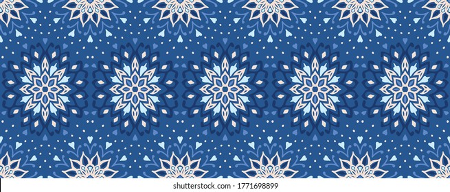 Seamless floral pattern. Stylized doodle flowers. Spanish ethnic embroidery. Folk ornament. Solar sign. Mediterranean print. Indian Oriental or Turkish textiles. Boho wallpaper. Hipster art.