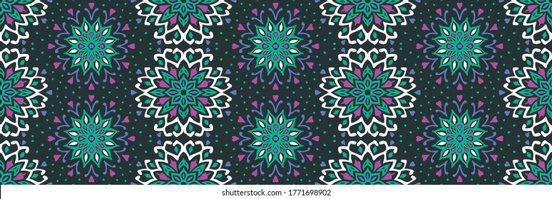 Seamless floral pattern. Stylized doodle flowers. Spanish ethnic embroidery. Folk ornament. Solar sign. Mediterranean print. Indian Oriental or Turkish textiles. Boho wallpaper. Hipster art.