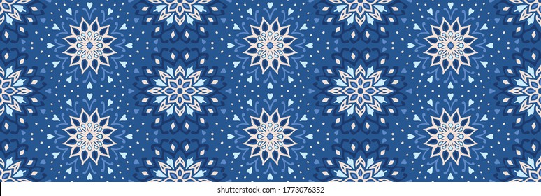 Seamless floral pattern. Stylized doodle flowers. Spanish ethnic embroidery. Folk ornament. Solar sign. Mediterranean print. Indian Oriental or Turkish textiles. Boho wallpaper. Hipster art.