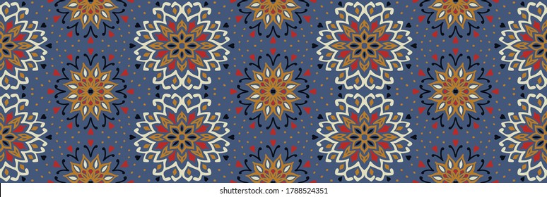 Seamless floral pattern. Stylized doodle flowers. Spanish ethnic embroidery. Folk ornament. Solar sign. Mediterranean print. Indian Oriental or Turkish textiles. Boho wallpaper. Hipster art.