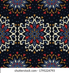Seamless floral pattern. Stylized doodle flowers. Spanish ethnic embroidery. Folk ornament. Solar sign. Mediterranean print. Indian Oriental or Turkish textiles. Boho wallpaper. Hipster art.