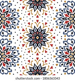 Seamless floral pattern. Stylized doodle flowers. Spanish ethnic embroidery. Folk ornament. Solar sign. Mediterranean print. Indian Oriental or Turkish textiles. Boho wallpaper. Hipster art.