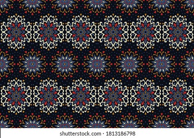 Seamless floral pattern. Stylized doodle flowers. Spanish ethnic embroidery. Folk ornament. Solar sign. Mediterranean print. Indian Oriental or Turkish textiles. Boho wallpaper. Hipster art.