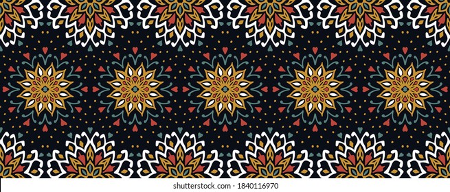 Seamless floral pattern. Stylized doodle flowers. Spanish ethnic embroidery. Folk ornament. Solar sign. Mediterranean print. Indian Oriental or Turkish textiles. Boho wallpaper. Hipster art.