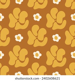 Seamless floral pattern for textiles, wrapping paper, wallpaper. The spring and summer pattern. Yellow background and abstract daisies