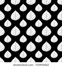 Seamless floral pattern with tree leaves. White silhouettes on black background.