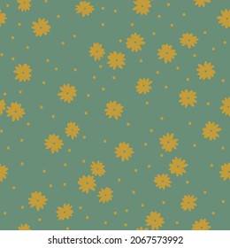 Seamless floral pattern. Trendy background of mustard flowers and dots. flowers scattered on a green background. Stock vector for printing on surfaces and web design.
