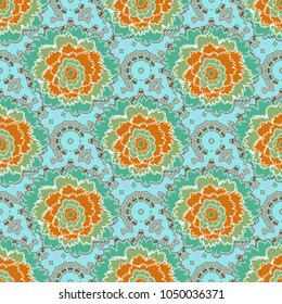 Seamless floral pattern. Vintage vector ornament in blue, orange and green tones. Use for wallpaper, printing on the packaging paper, textiles.