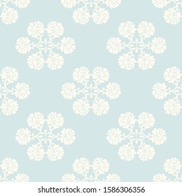 Seamless floral pattern. Wallpaper, fabric with rounded ornament with flowers, pastel blue background in vector