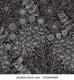 Seamless floral pattern with white decorative flowers on black background