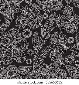 Seamless floral pattern with white decorative flowers on black background