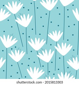 Seamless floral pattern of
white flowers and blue dots . wonderful flowers on a light blue background. Stock vector for printing on surfaces and web design.