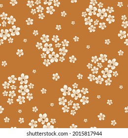 Patrón floral sin soldadura de
flores blancas. flores maravillosas sobre un fondo de terracota. Vector de material para imprimir en superficies y diseño web.