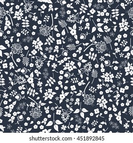 Seamless floral pattern. White flowers on a dark background