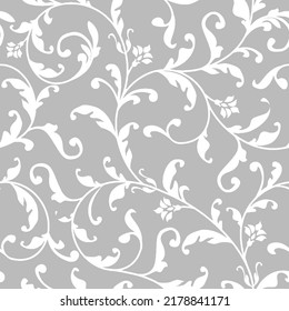 Patrón floral sin soldadura para envoltura, textil, papel tapiz. Decoración floral decorativa con remolinos y flores en el fondo gris.