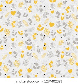 Seamless floral pattern with yellow silhouettes of flowers, brunches and hearts and on gray background. Light and simple pattern for your designs