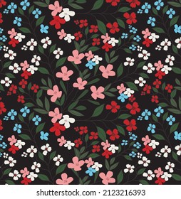  Patrón floral sin foco, fondo con flores pequeñas de color blanco rojo y rosa, azul sobre fondo negro. Patrón floral botánico para impresión brillante.ilustración vectorial.coagulación de tela usada, papel tapiz.