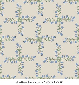 Seamless floral square pattern with crosses made of blooming bluebell flower branches.