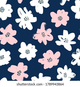 Seamless floral vector pattern with daisy or chamomile. Hand drawn blue and pink paint illustration with abstract floral motif. Artistic colorful print for fabric, wrapping paper, wallpaper design