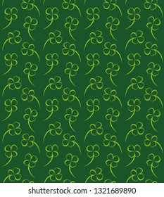 Seamless floral vector pattern with four-leaf clover in green color