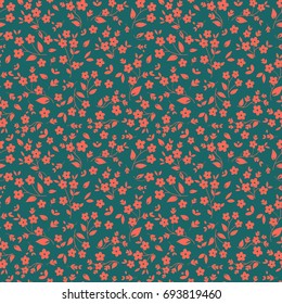 Seamless floral vector pattern orange pinkish small flowers on dark green background, ditzy, millefleaurs, fabric, tapestry, quilting