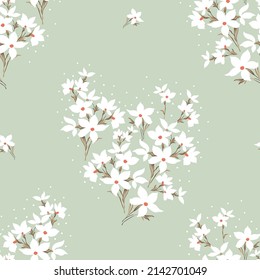 seamless floral vector white small flowers with cream leaves bunches pattern on green background