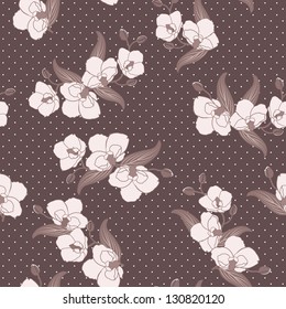 Seamless floral wallpaper with branches of orchid flowers