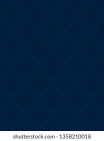 Seamless floral wallpaper pattern. Blue floral ornament on dark blue background. Contemporary pattern