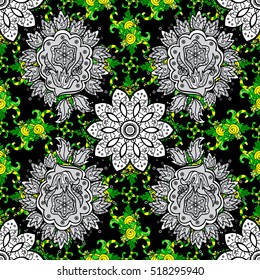 Seamless flower pattern with green, blue, pink and white elements on black background