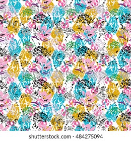 Seamless flower pattern with green, yellow, blue, pink and black elements