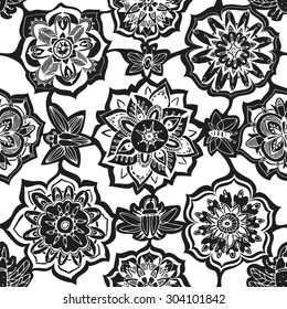 Seamless flower pattern. Lovely hand-drawn summer flowers. Moths and butterflies between flower. Vintage stile. Monochrome. Cartoon style decorative graphic flowers