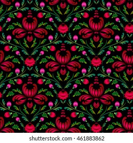 Seamless flower pattern in petrikovsky style. Bright red flowers on a black background. Ethnic motifs