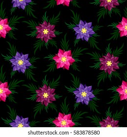 Seamless flowers on a black background. Pattern.