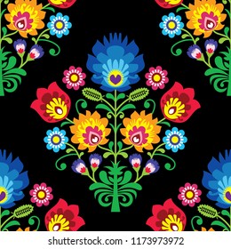 Seamless folk art vector pattern - Polish traditional repetitive design with flowers - wycinanki lowickie.
Retro floral background, Slavic colorful textile or wallpaper design on black, retro decorati